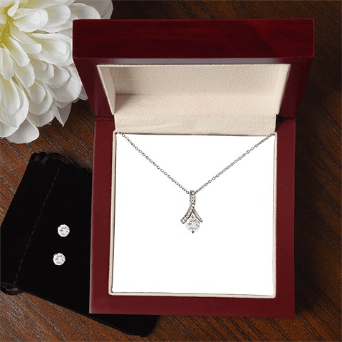 Imagine her reaction when your loved one opens this stunning gift! The Alluring Beauty Necklace and Cubic Zirconia Earring Set is a sweet treat that is sure to dazzle your special someone! The necklace and earring pairing provides loads of sparkle when worn together or separately, and is perfect for any occasion! Do not miss out on this special offering!